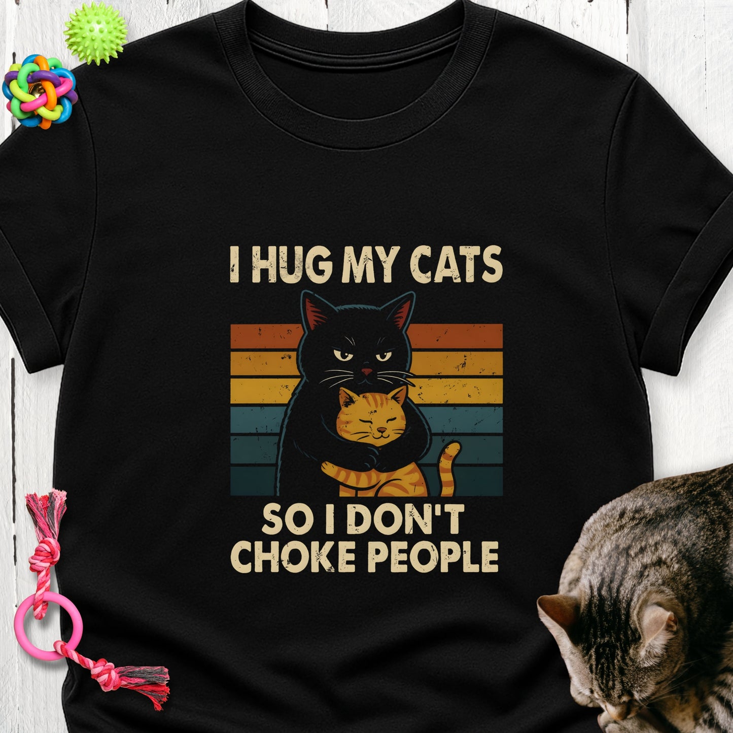 I hug my cats so I don’t choke people